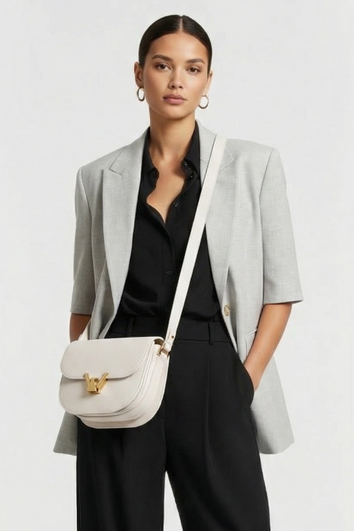 LEATHER CROSS BODY BAG IN CREAM 1