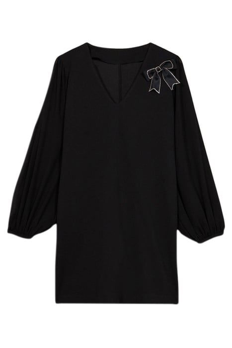 Dual-material dress with brooch 3